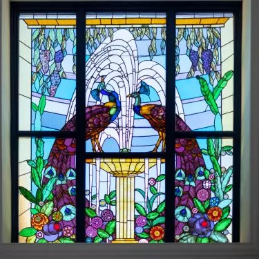 The peacock motif was often used in Liberty-style arrangements