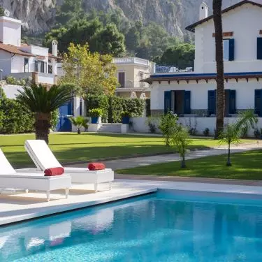 The infinity pool is surrounded by Mediterranean vegetation