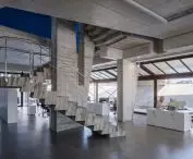The lab's workspace in Alcalá de Guadaíra is minimalist, and the raw concrete on the walls adds to its brutalist expression