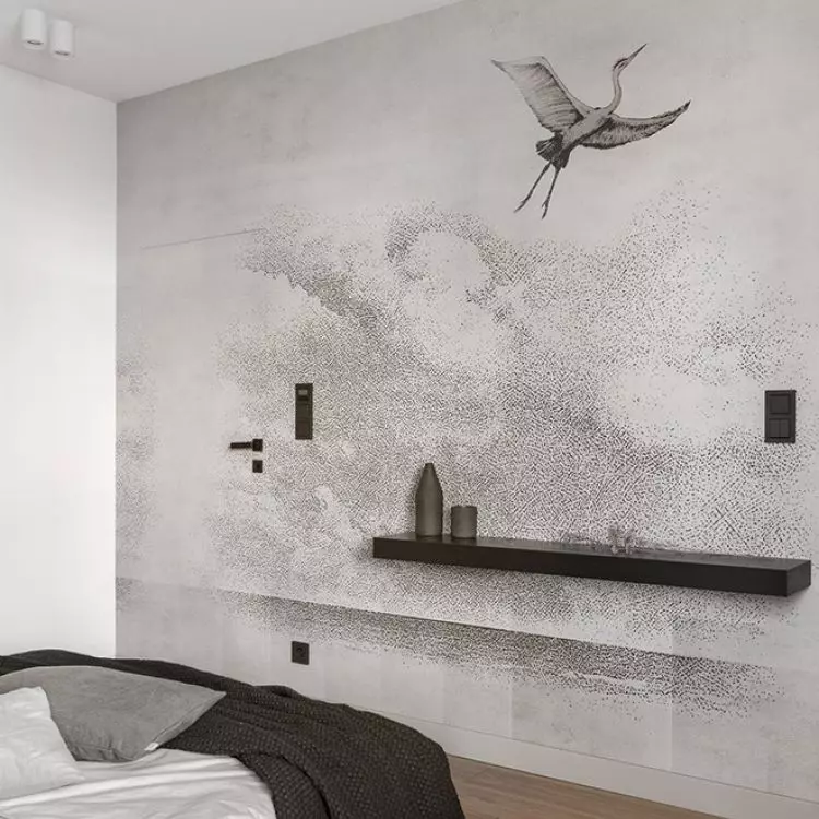 The wall opposite the bed was covered with wallpaper with a crane motif