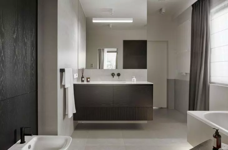 The bathroom can be accessed from both bedrooms