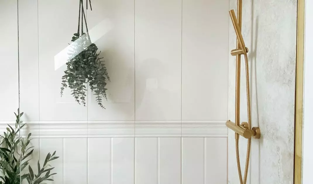 The shower area is complemented by plants