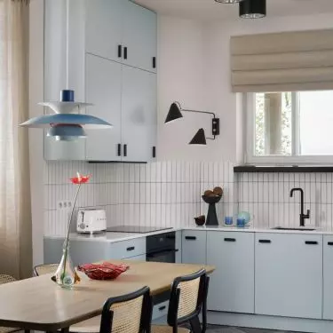 Blue fronts brighten up the space