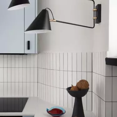The white tiles were juxtaposed with contrasting black grout
