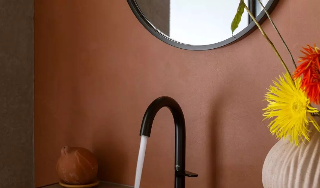 Metal furnishings contrast with colorful walls