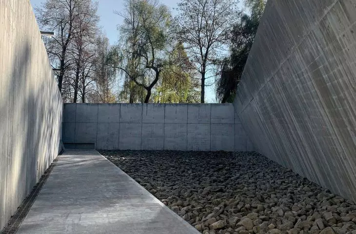 Memorial Square paved with granite stone from demolition of former road leading to slaughterhouse