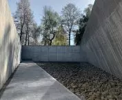 Memorial Square paved with granite stone from demolition of former road leading to slaughterhouse