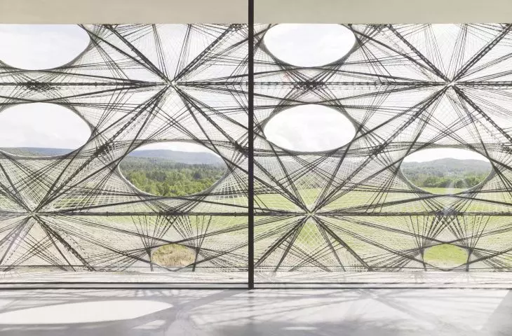 Texoversum Center for Modern Textile Technology in Reutlingen - precisely designed openings in the facade tiles provide views of the surroundings and access to natural light