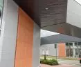 Perforated sheets and bent-drawn mesh in modern office buildings