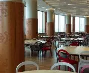 Perforated sheets and bent-drawn mesh in modern office buildings