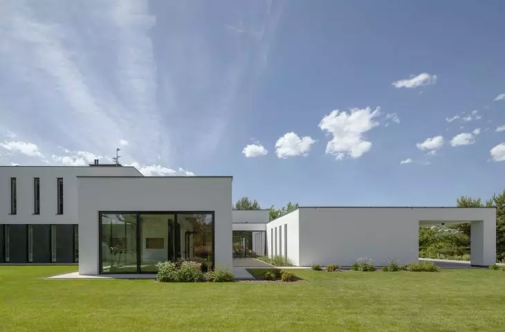 The building has a simple form of several cuboids