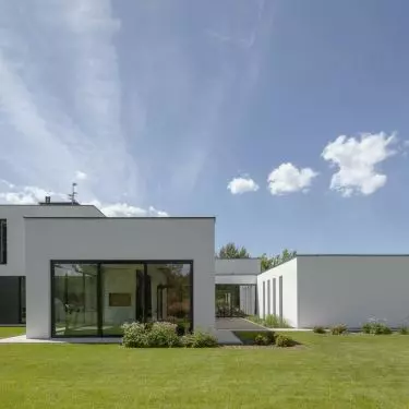 The building has a simple form of several cuboids