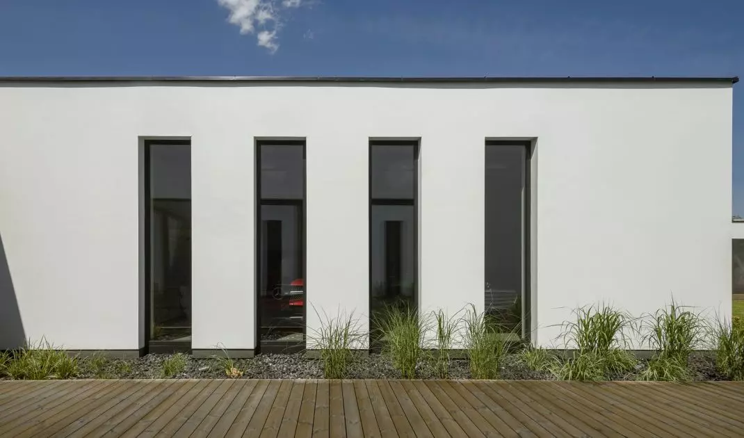 The garage will accommodate two cars