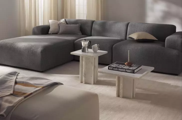 Softer forms of furnishings will balance the austere character of the interior