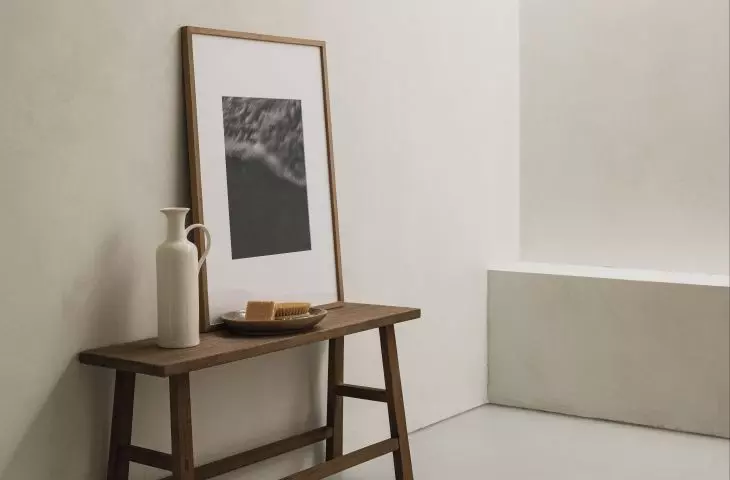 Warm up a minimalist arrangement by adding wooden elements