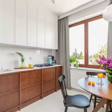 A three-foot built-in provides storage space in the kitchen