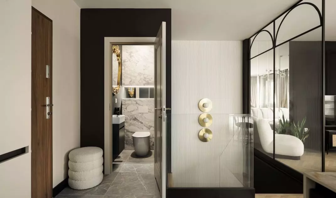The toilet is located on the first floor, next to the living area