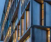 LCI Education campus in Barcelona's Poblenou district - the building's austere façade evokes a brutalist aesthetic 