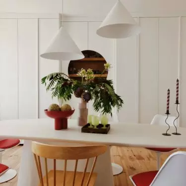 A dining room that also serves as a home office