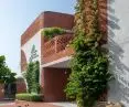 Healthy Planet School in Noida - the exterior walls are almost entirely lined with brick 