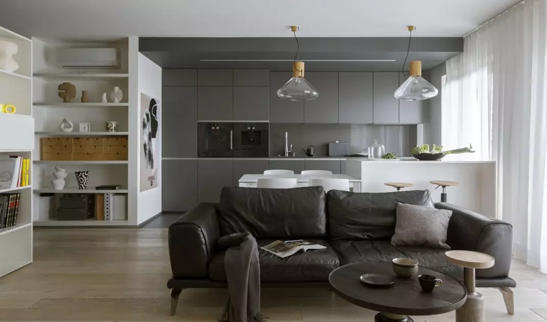 The apartment is dominated by a subdued color scheme
