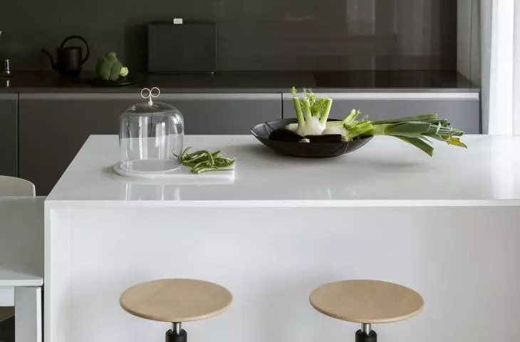The kitchen build has a shade of dark gray