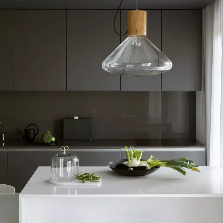 The kitchen build has a shade of dark gray