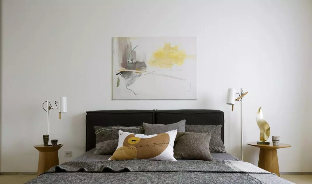The bed headrest resembles two large pillows
