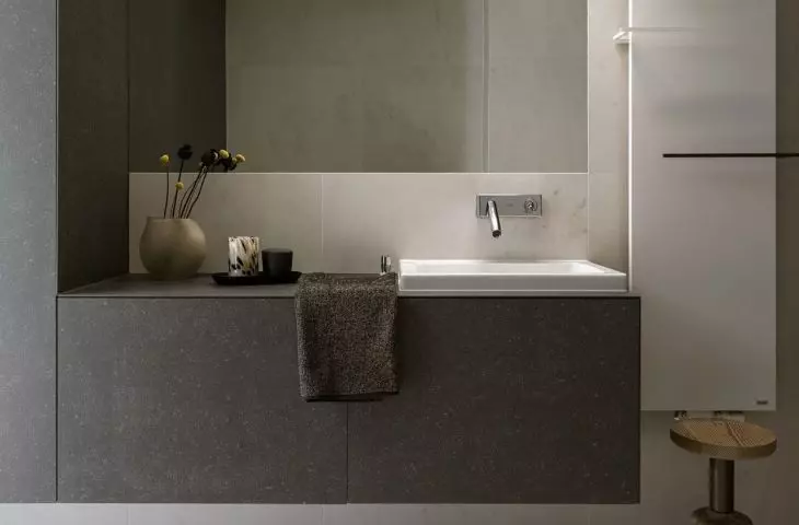 Industrial lighting fits in with the muted color scheme