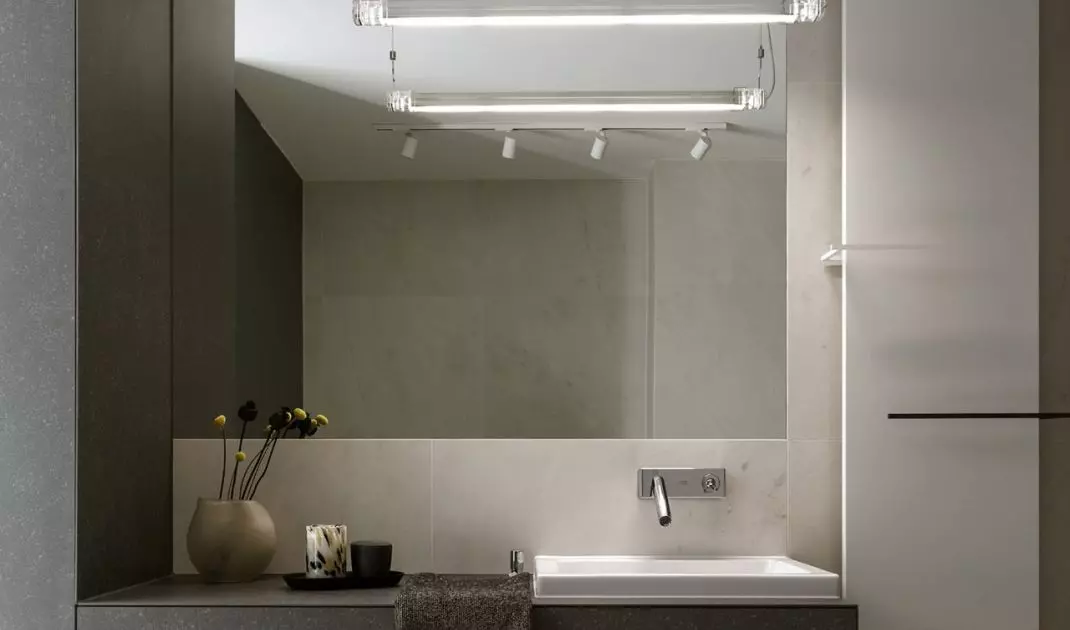 Industrial lighting fits in with the muted color scheme