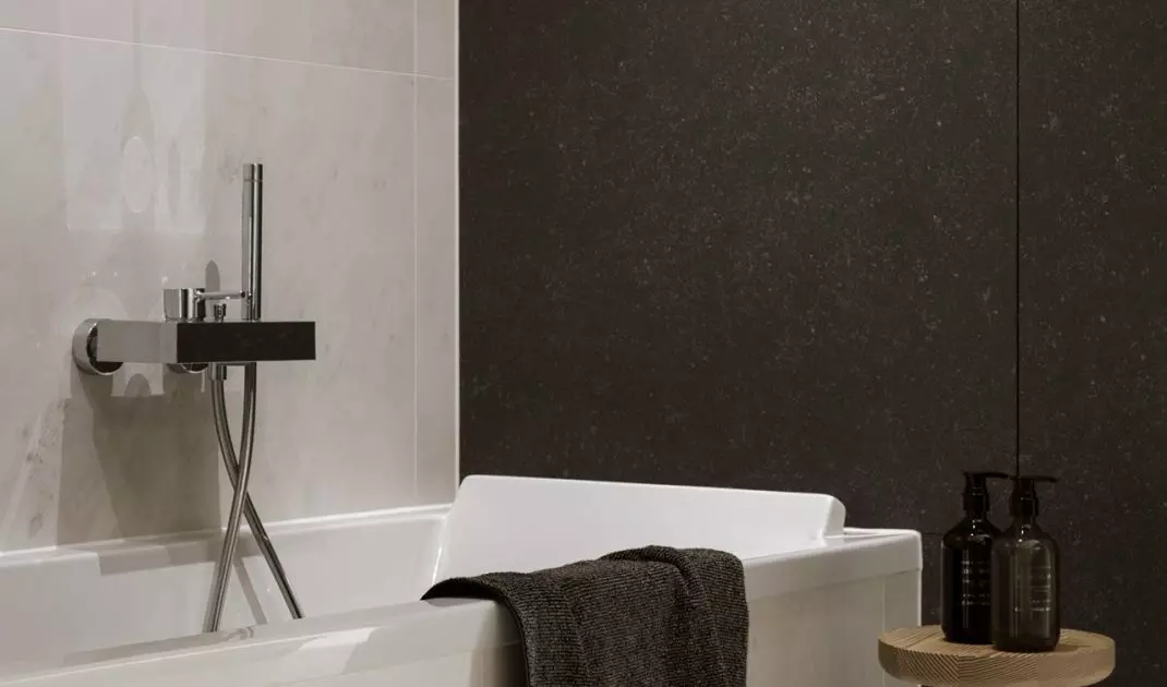 Stool with wooden seat and stone base makes an interesting addition