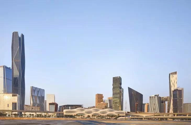 King Abdullah Financial District (KAFD) metro station in Riyadh - the body of the building against the background of urban development