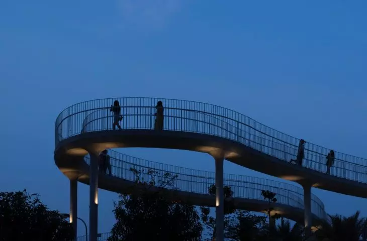 Art Exhibition Center in Son Tra, Vietnam - view of walking spaces at night 