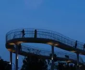 Art Exhibition Center in Son Tra, Vietnam - view of walking spaces at night 