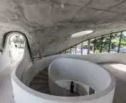 Art Exhibition Center in Son Tra, Vietnam - a spiral staircase connecting two levels 
