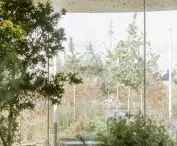Copenhagen Opera Park (Operaparken) - the glass walls of the greenhouse offer views of the surrounding greenery 