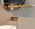 Concealed towel rack and faucet in brushed copper PVD