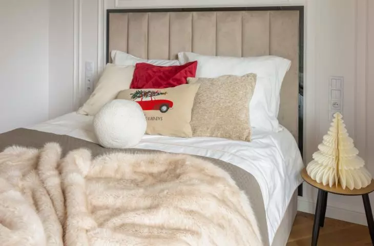 Christmas pillows and gold accents will create a cozy atmosphere