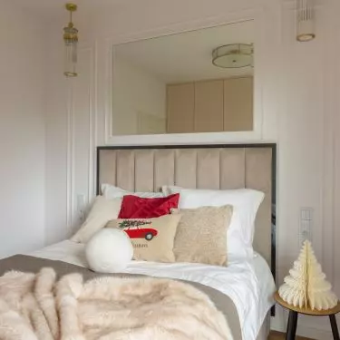 Christmas pillows and gold accents will create a cozy atmosphere