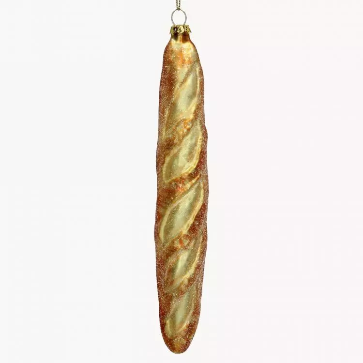The baguette bauble is a charming touch reminiscent of French cuisine