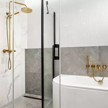 The architects managed to fit both a shower and a bathtub