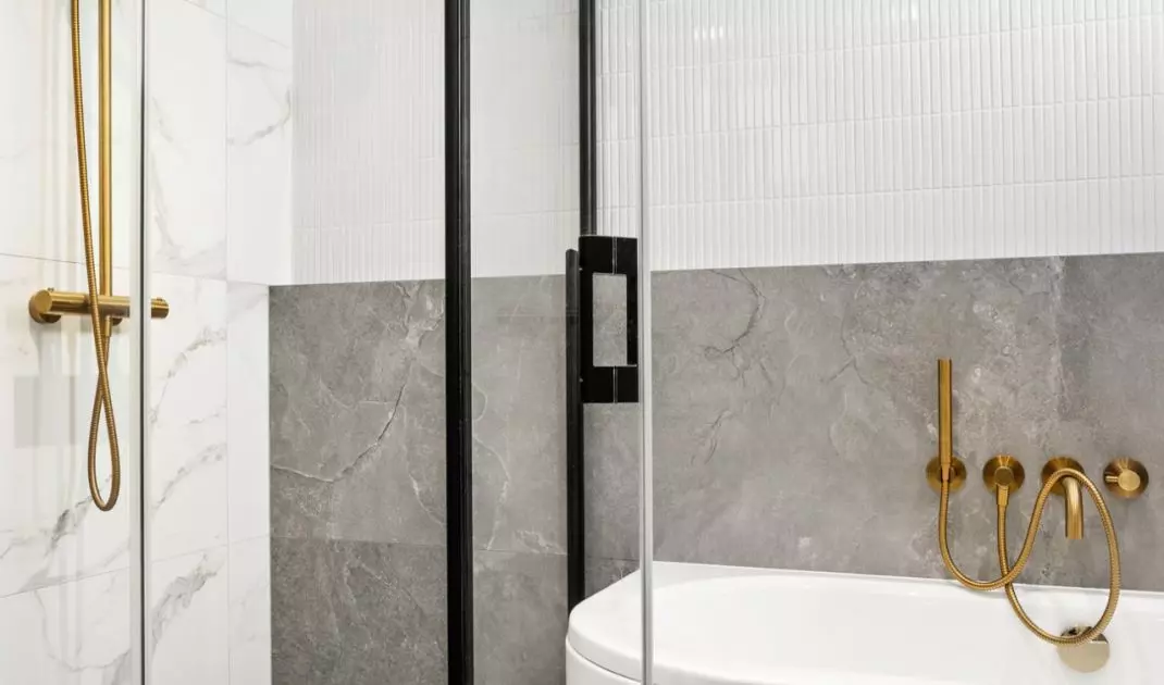 The architects managed to fit both a shower and a bathtub
