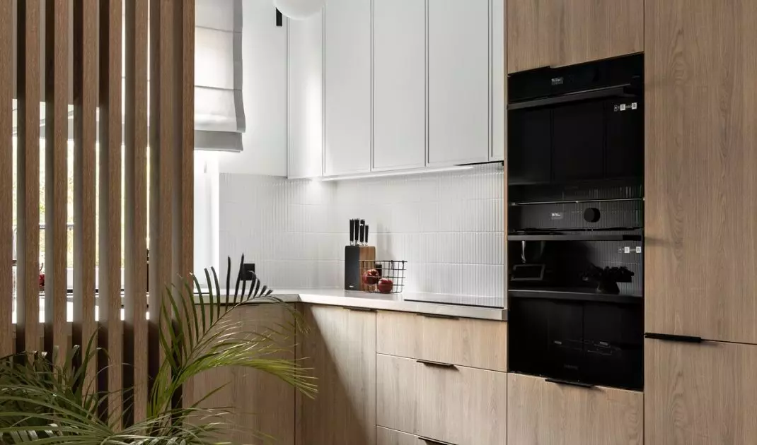 Architects unified the floor in the living area