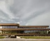 The circular and energy-neutral Omega office building in Hendrik-Ido-Ambacht, the Netherlands - the building's floors have been separated by wide strips that surround its perimeter