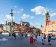 Castle Square in Warsaw - in the background you can see stands with door-to-door trade and clouds of helium balloons