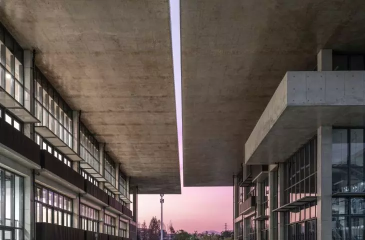 Wenzhou Medical University International Exchange Center - lecture building (left) and activity center (right) at dusk 