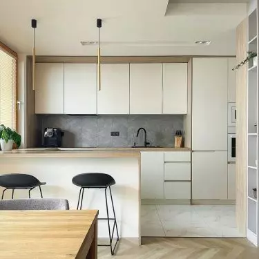 Wooden countertops warm up a minimalist design