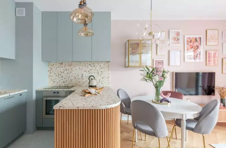 Terrazzo covers both the countertop and the wall above it 