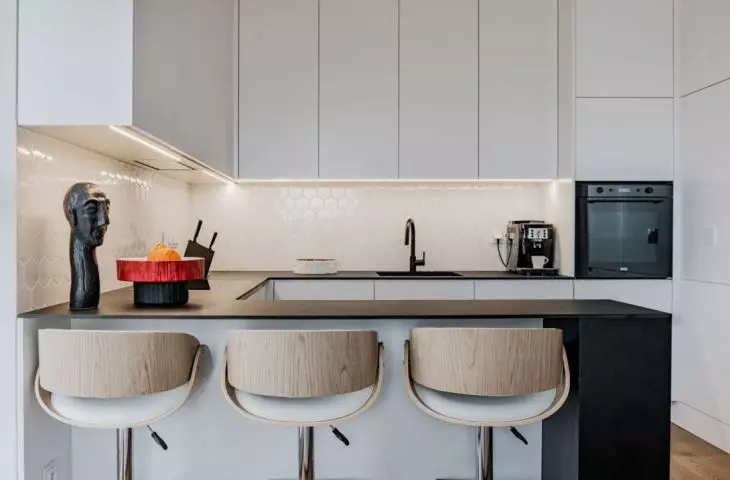 The kitchenette is semi-open