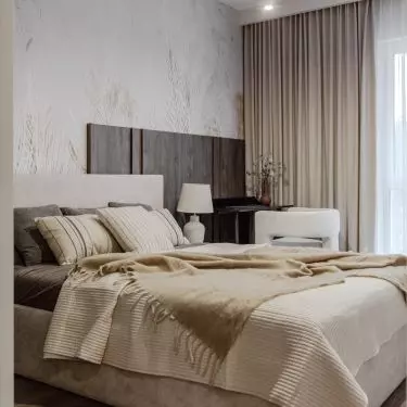 Bedroom with upholstered bed